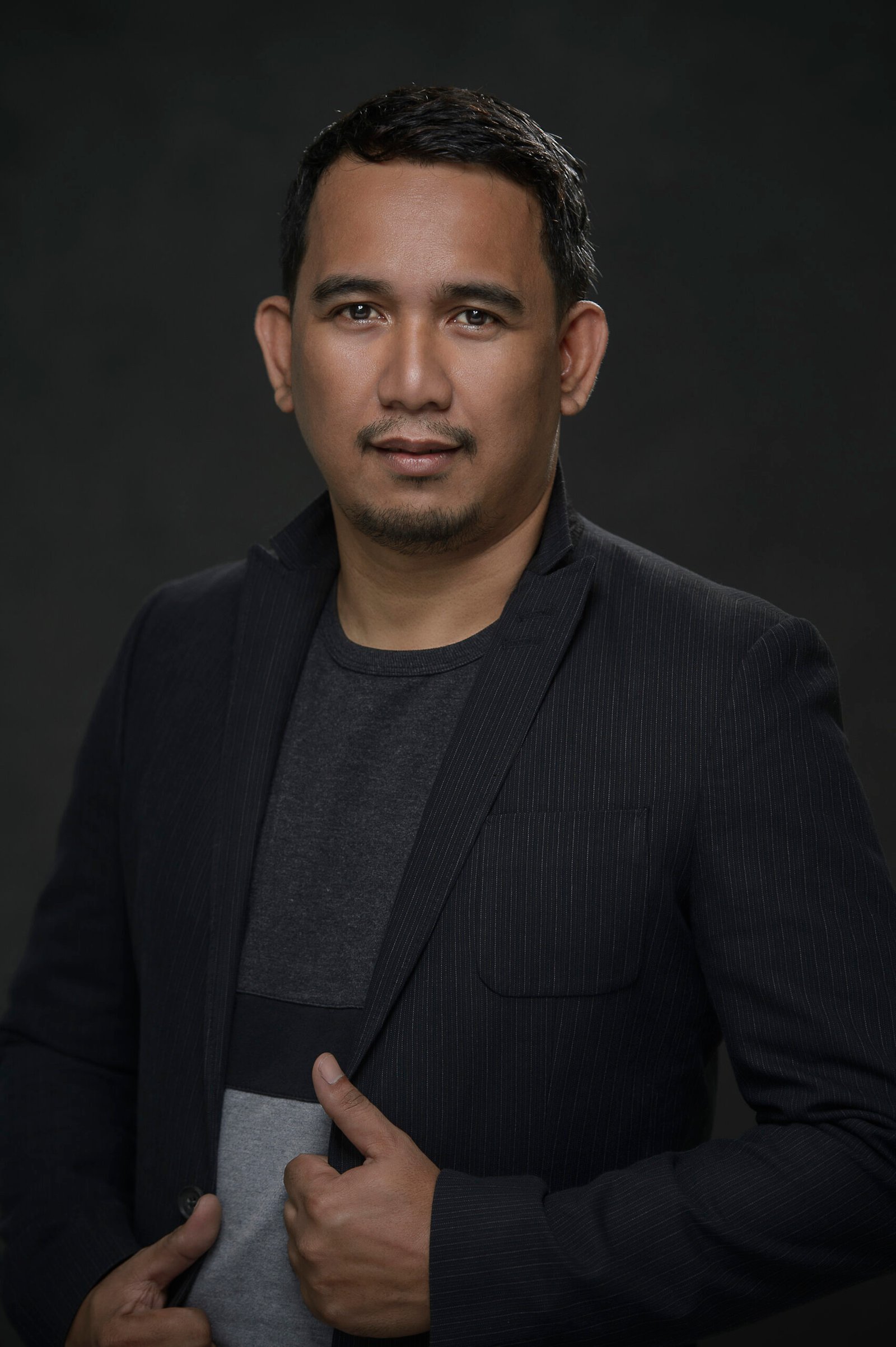 Raffy Mansueto portrait used as a temporary About Us image